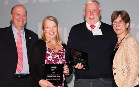 Dr. Dittel receiving an award from the MS Society.