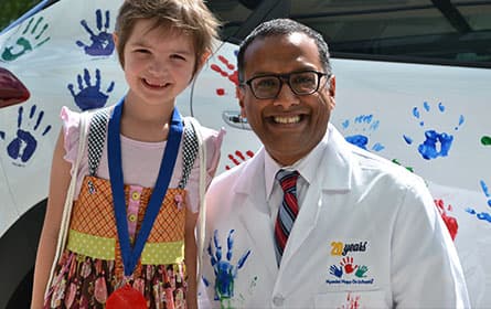 Dr. Rao accepting a research grant.