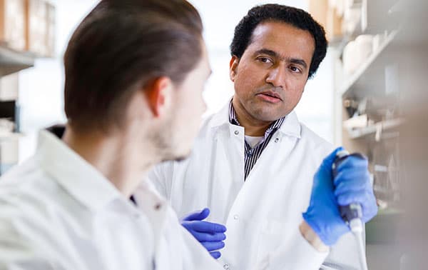 Karen-Sue Carlson, MD, PhD and Nan Zhu, PhD collaborating.