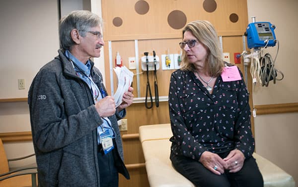 Dr. Kenneth Friedman discussing options with a patient.