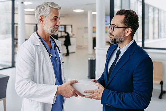 Doctor having a discussion with a medical consultant.