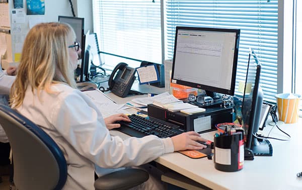 Technician Working on a Computer