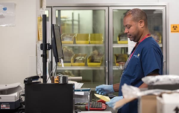 Technician fulfilling a product order.