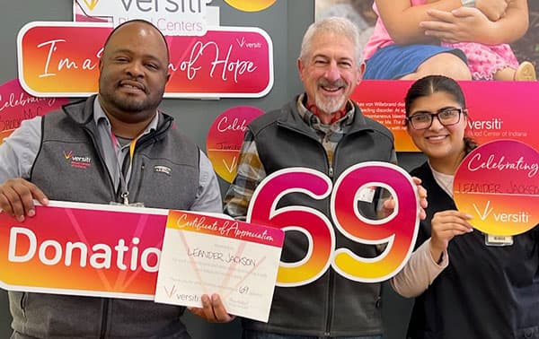 Happy group of donors, including a first time donor, and a donor with over 69 gallons.