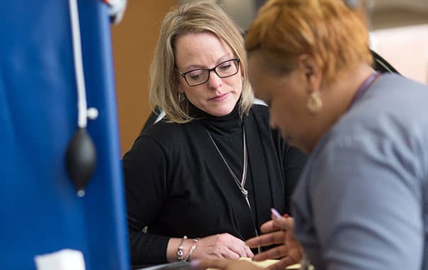 Donor answering questions during the screening process.