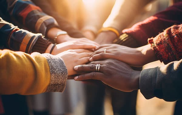 People holding hands.