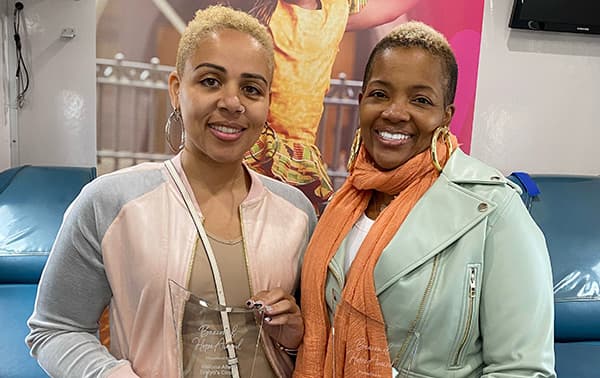 Smiling blood drive hosts