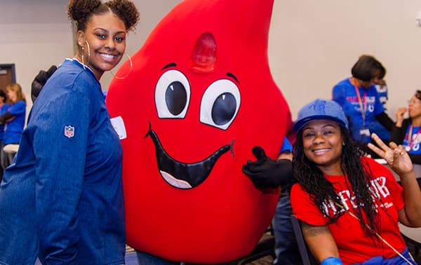 Happy donors with dot at a recent Bleed Blue Blood Drive