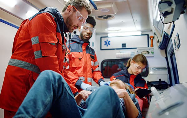 Paramedics working on a injured person